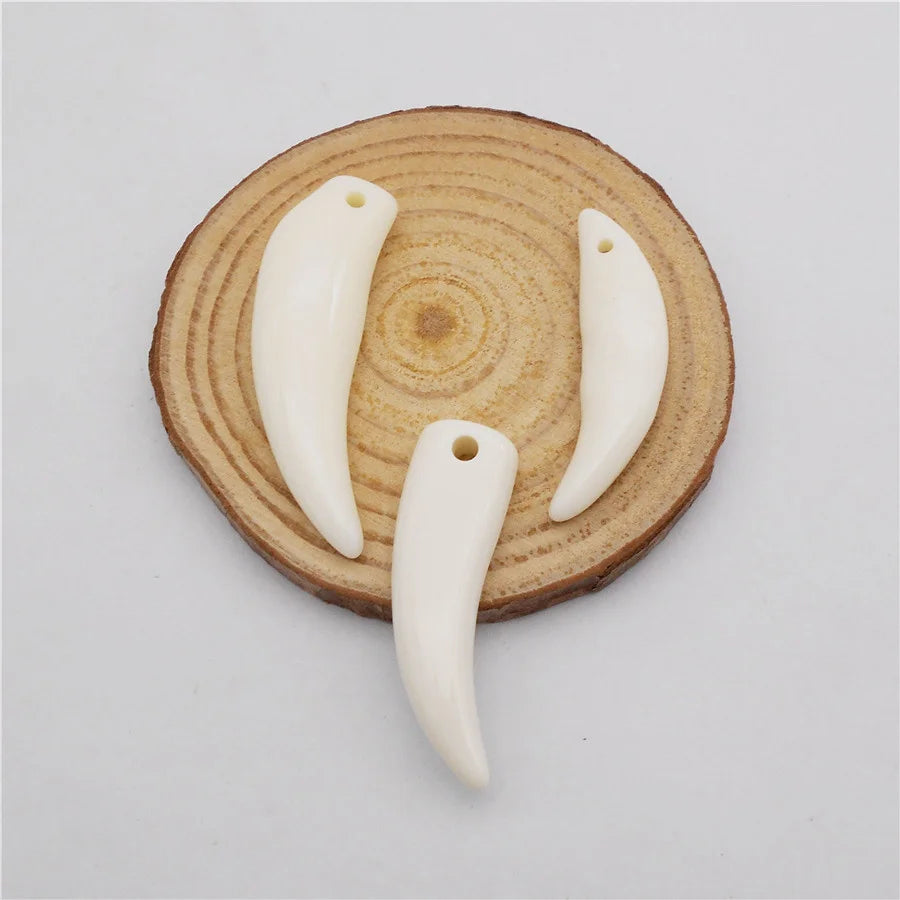 Wolf Tooth Charms