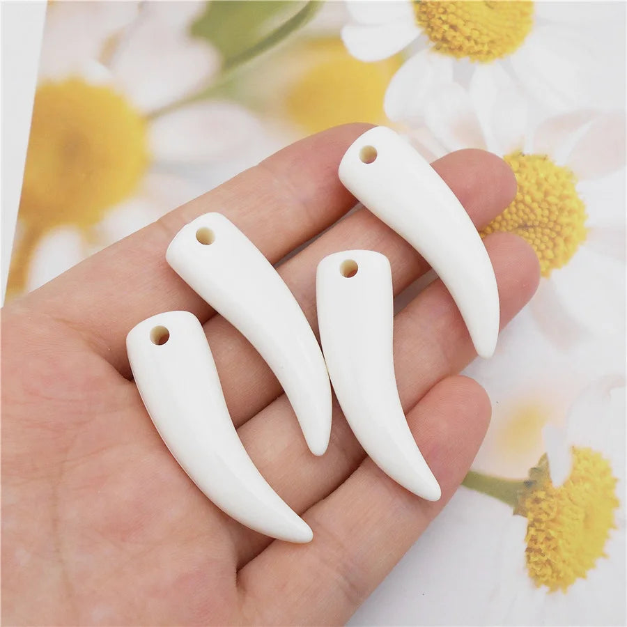 Wolf Tooth Charms