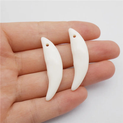 Wolf Tooth Charms